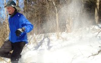 Canham tossing snow on a downhill practice for his next scheduled race