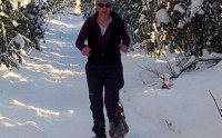 Nellie Ballou racing and winning her first snowshoe event