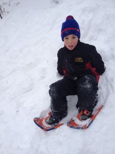 My oldest trying out his new snowshoes