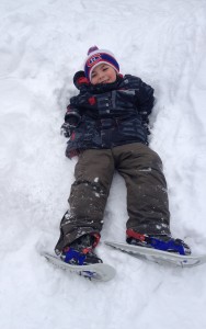 My youngest on his Tubbs Snow Glow snowshoes