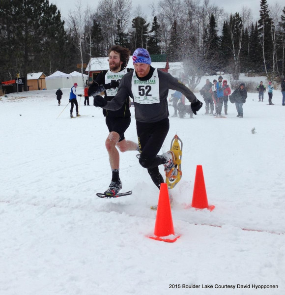 The clock timed them to the exact tenth of a second in the most exciting finish of the day: 52:26.7. Note the ski crowd paying attention to this snowshoe finish!