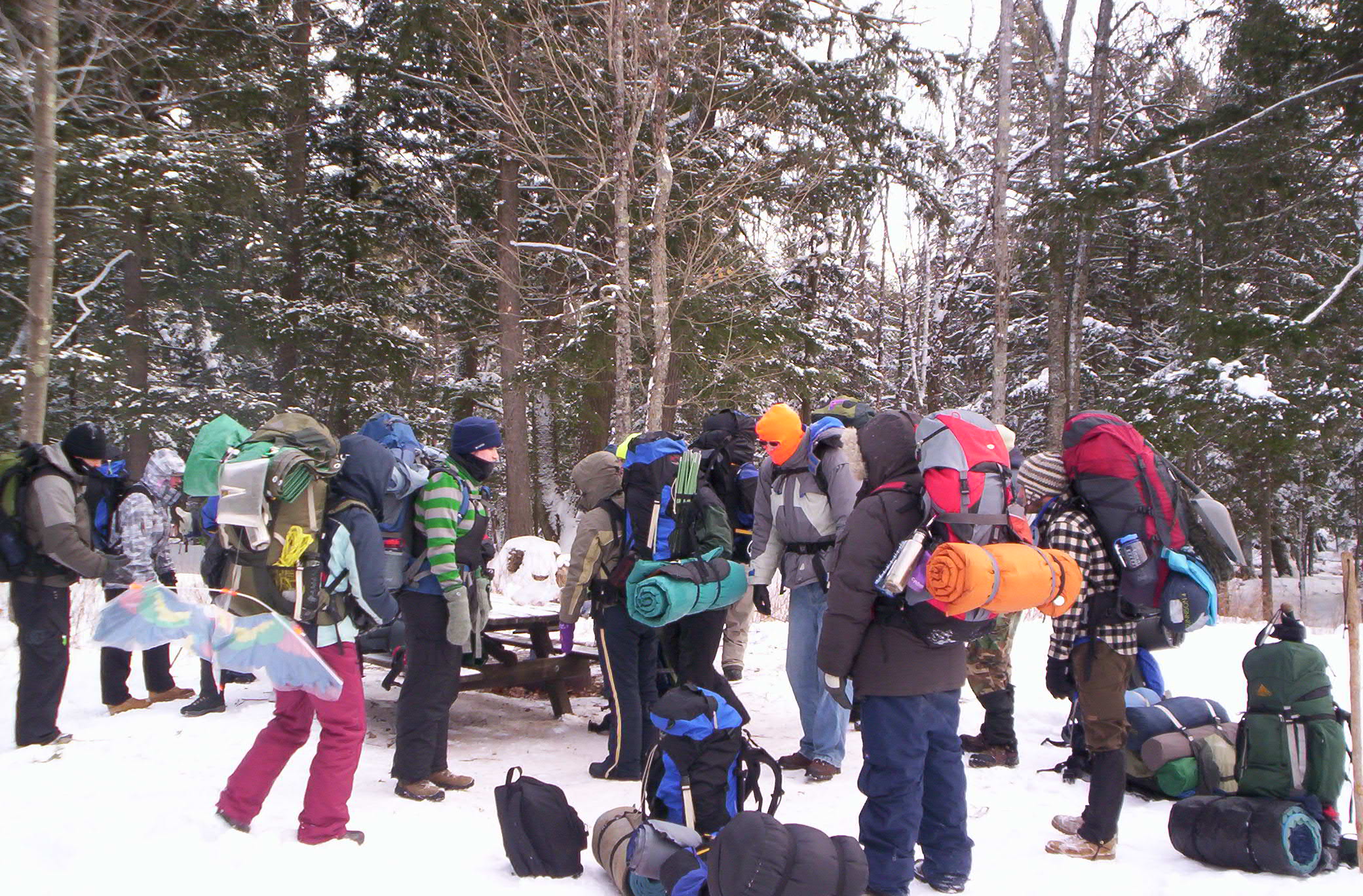 students with packs for winter backpacking