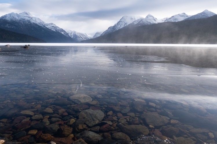 winter photo competition: hazy morning on lake with mountains