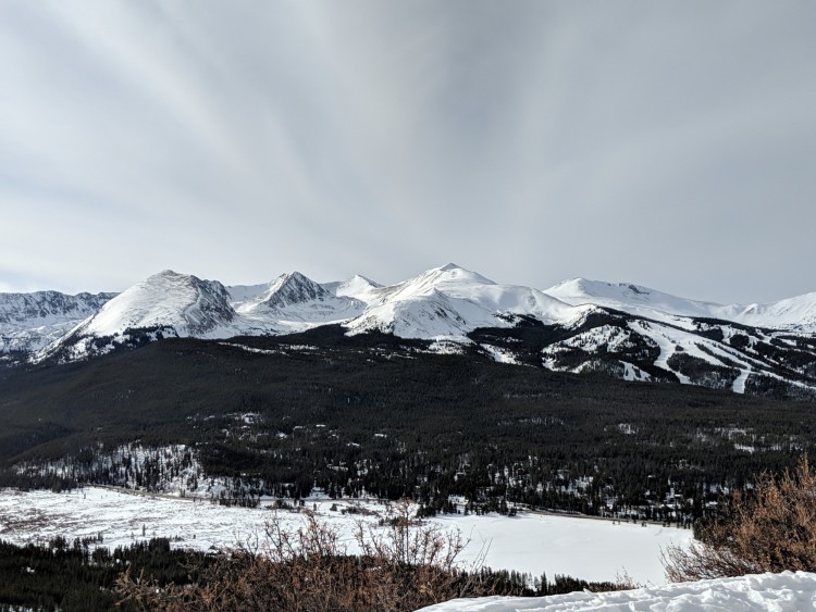 bright, cloudy sky with mountain in background, Breckenridge CO
