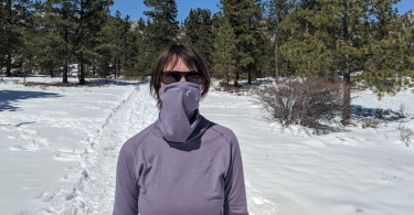 wearing the Ridge Merino Women's Aspect High Neck Top