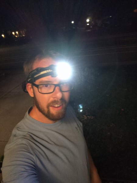 selfie of man with Silva Trail Speed 4XT headlamp on nightly run