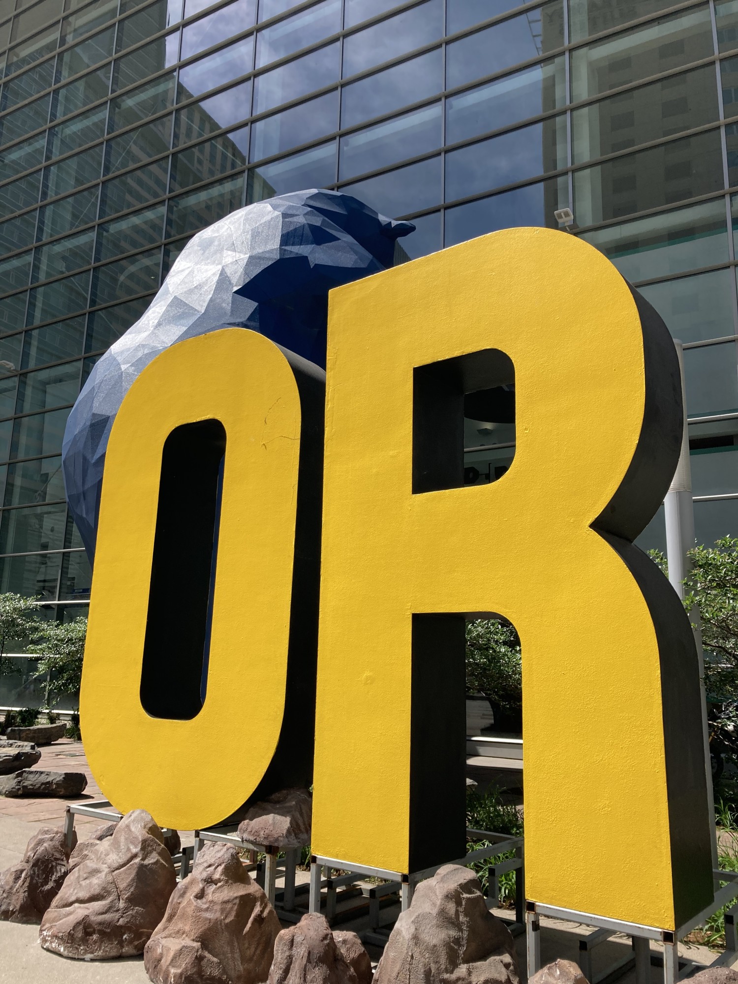 Outfoor dealership sign near Denver Convention Center blue bear