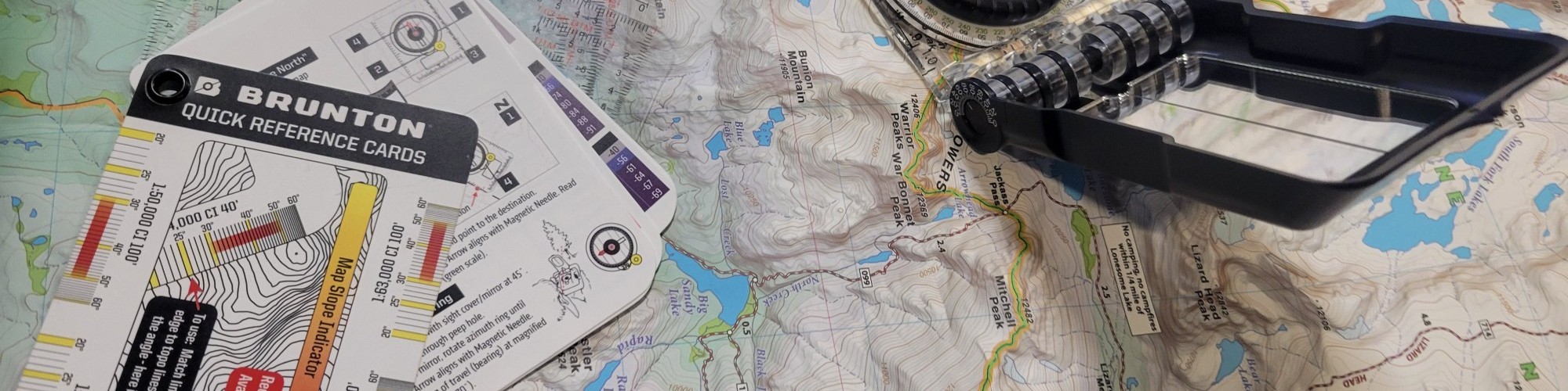 map, compass, reference cards