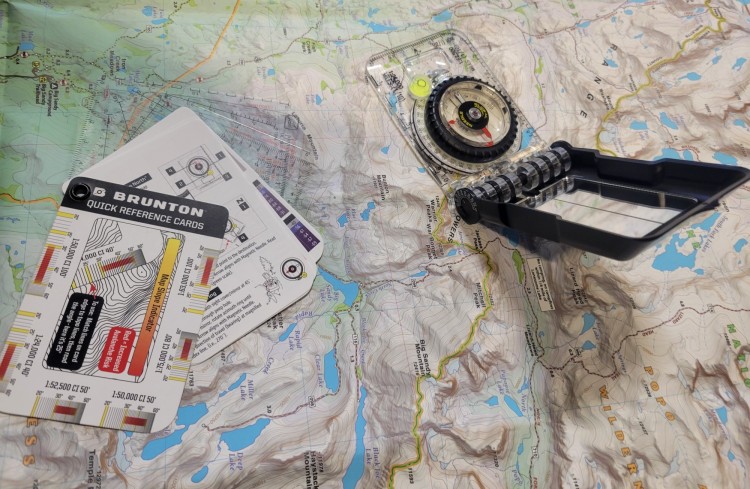 map, compass, reference cards