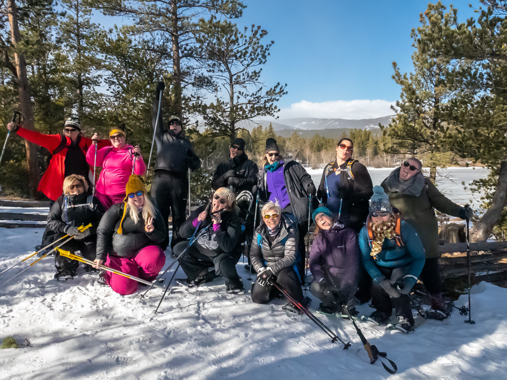 group photo of participants at WNDRoutdoors size inclusive snowshoeing event