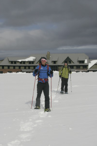 Snowshoeing in front of Highland Center Lodge at Crawford Notch. Credit: Herb Swanson, Courtesy of AMC