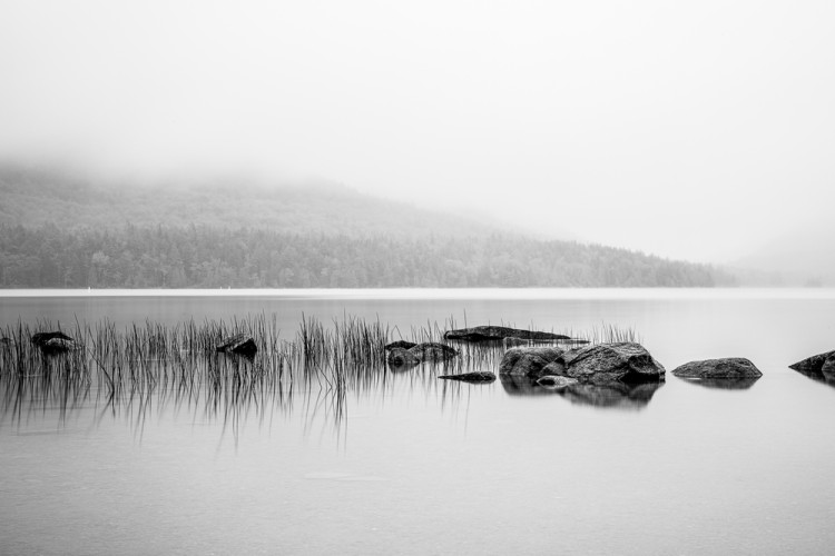 eastern U.S snowshoeing: lake in winter with clouds in background