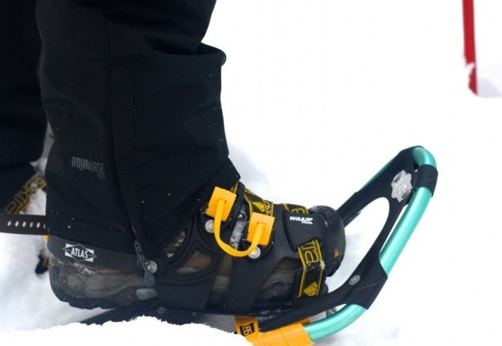 close up of Atlas Women's Access snowshoes in the snow