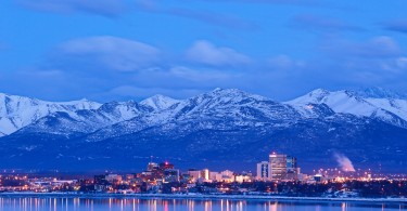 Anchorage skyline in winter withChugach mountains in background