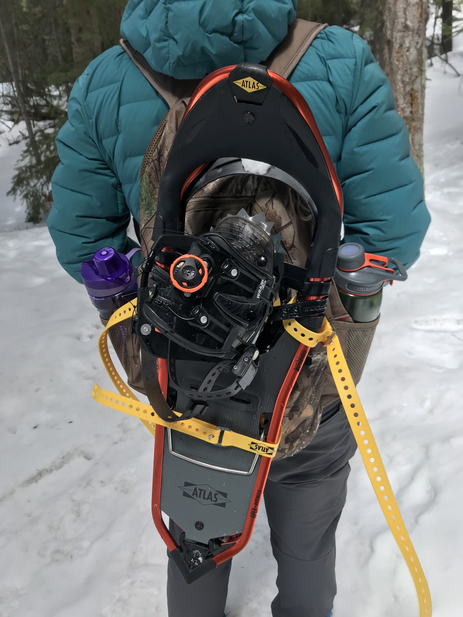 Atlas Apex snowshoes strapped to backpack