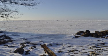 snowy rocks and lake in Buffalo NY