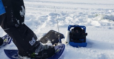 close up of Crescent Moon foam snowshoes on ice