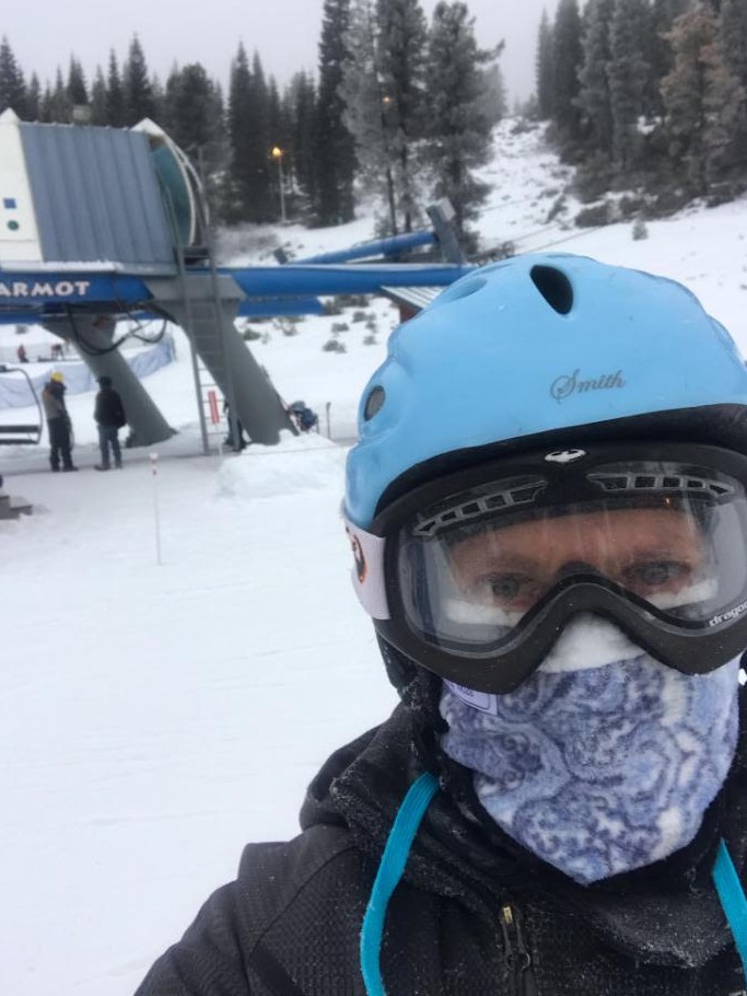 man wearing Cozy nose at ski resort