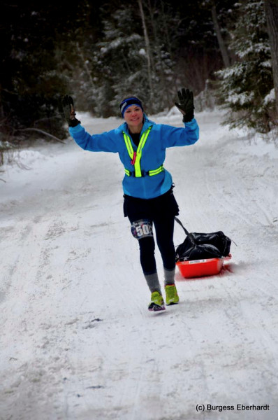 Carla Goulart displaying her winning style as the overall women's winner on foot. From her FB page, photo by Burgess Eberhardt