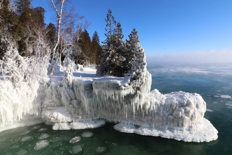 winter activities Door County: frozen waterfalls in Cave Point County Park