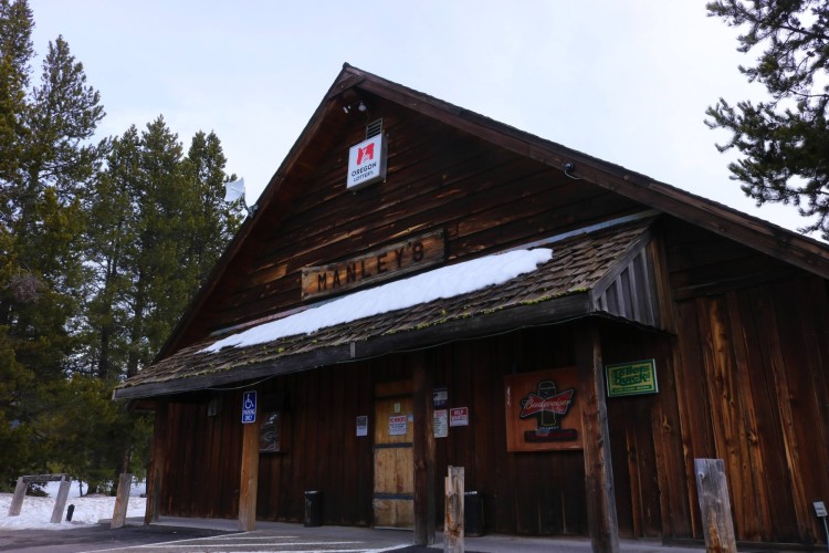 view of restaurant with trees on either side