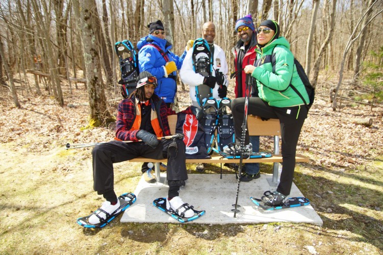 NBS snowshoers posing for photo before snowshoeing