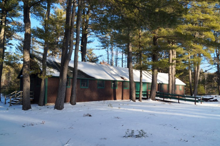 CCC Museum surrounded by trees in winter