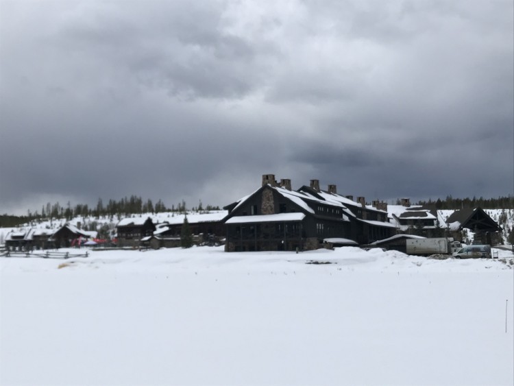 Devil's Thumb Ranch in snowy landscape under dark sky