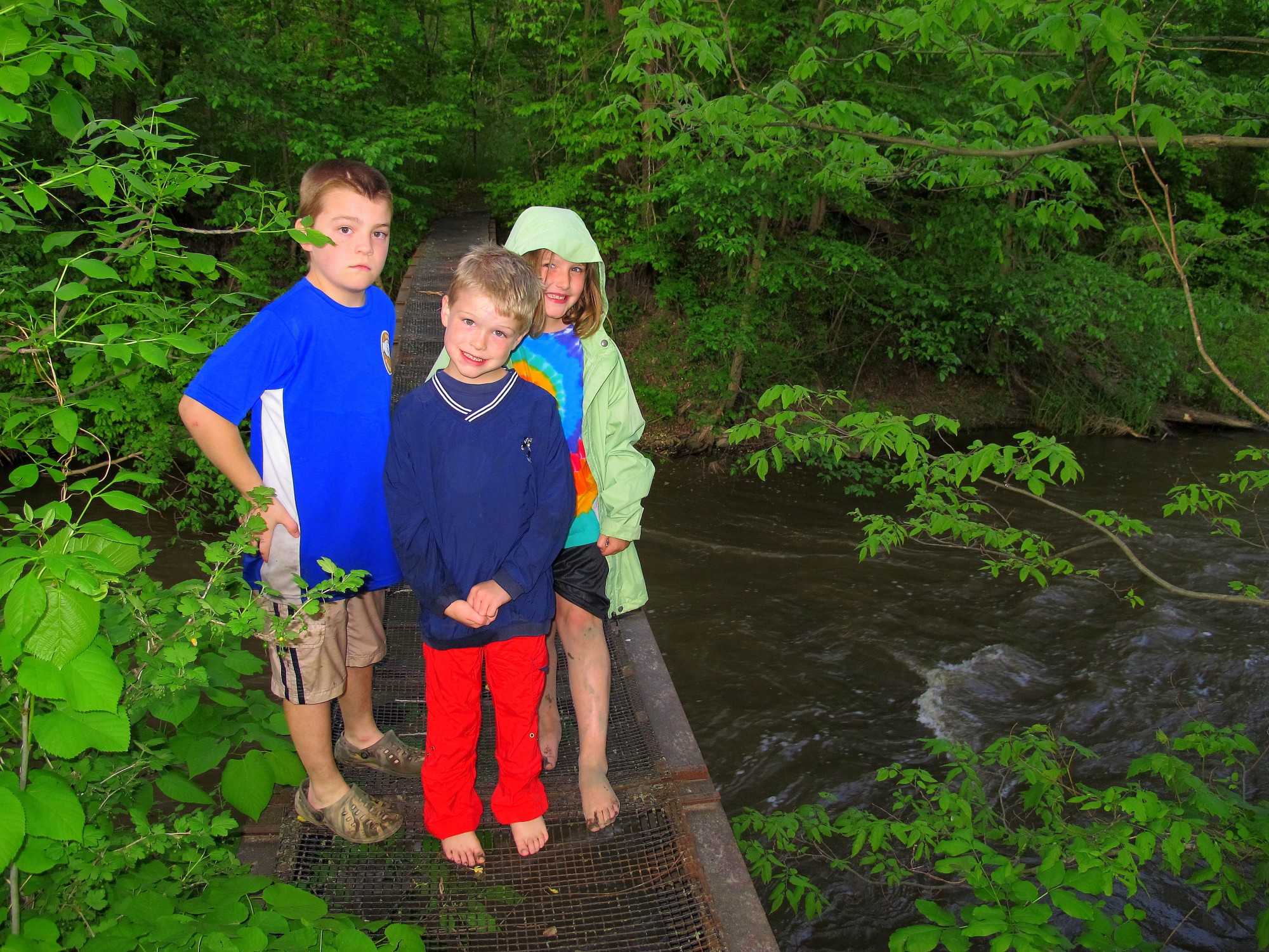 kids on footbridge after mothers day kayaking