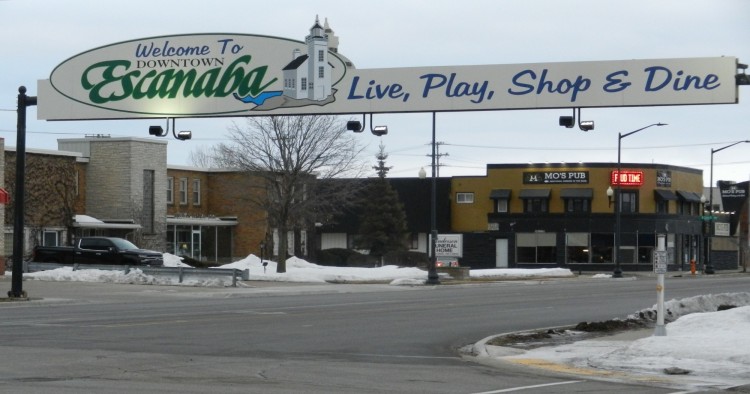 welcome sign for Escanaba Michigan