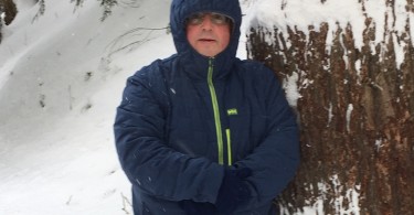 man wearing the Helly Hansen Stretch Insulator Jacket in cold weather