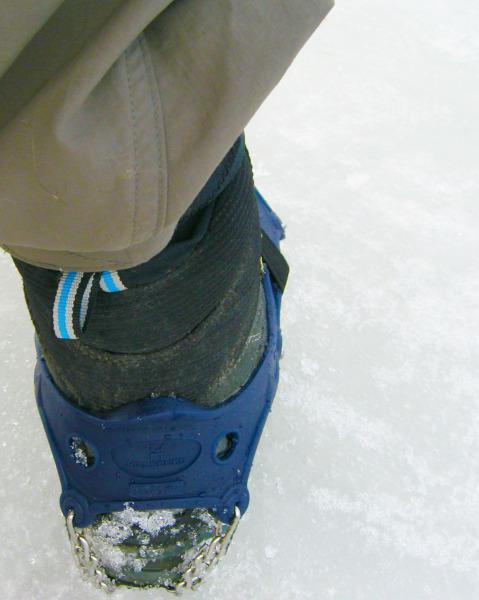 Rear view of the Hillsound Trail Crampon Ultra. Similarly to snowshoe bindings, a boot design incorporating a rear notch goes a long way towards keeping the rubber uppers from sliding down.