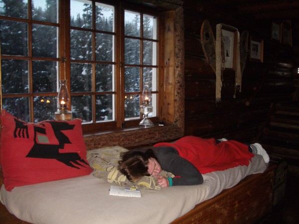 Taking a nap before dinner at Skoki Lodge