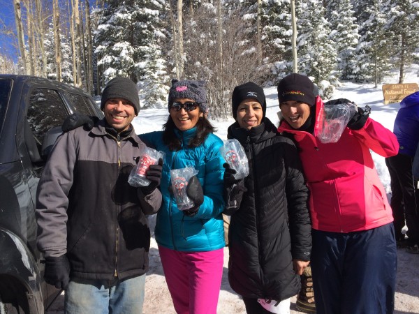 Participants in the 2016 Santa Fe Snowshoe Classic show off their well-deserved pint glasses.