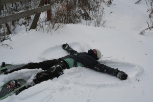One of their favorite things to capture on film, Mommy doing a snow angel