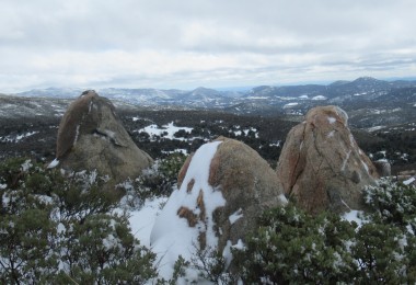 view from a mountain top with boulders in foreground