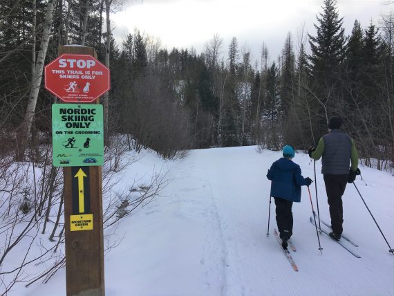 Nordic skiing sign- follow trail etiquette