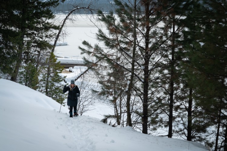 snowshoeing up hill in McCall, Idaho