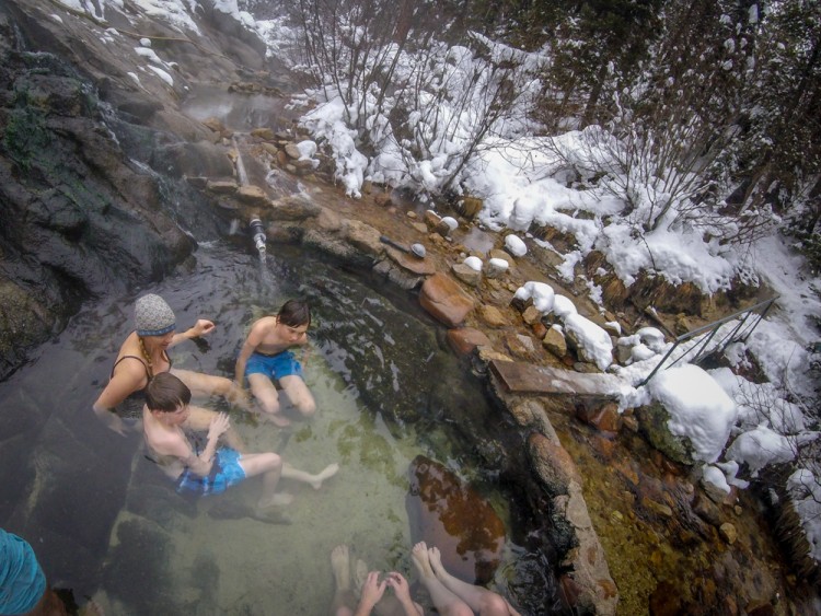 family soaking in hot springs, Idaho