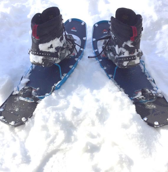 snowshoeing tips for fit: snowshoes with boots in them 