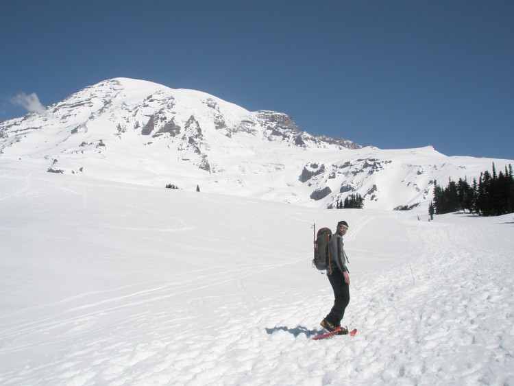 man snowshoeing on Mount Rainier