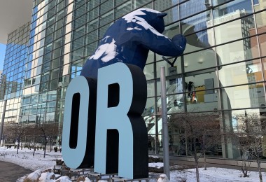 blue bear with Outdoor Retailer sign in front of Denver Convention Center