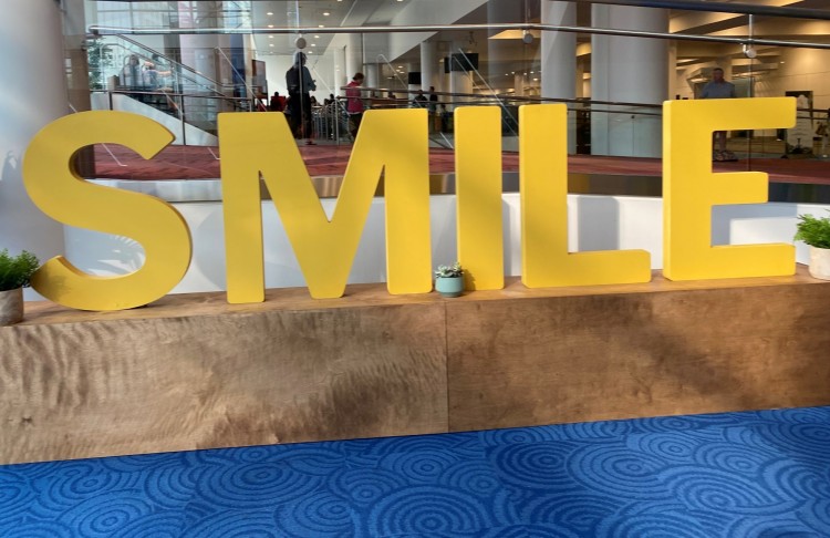 smile sign at outdoor retailer