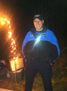 Three Rivers Park District Officer Danny Schmitz keeping an eye on the park . . . and Natchez Mountain!