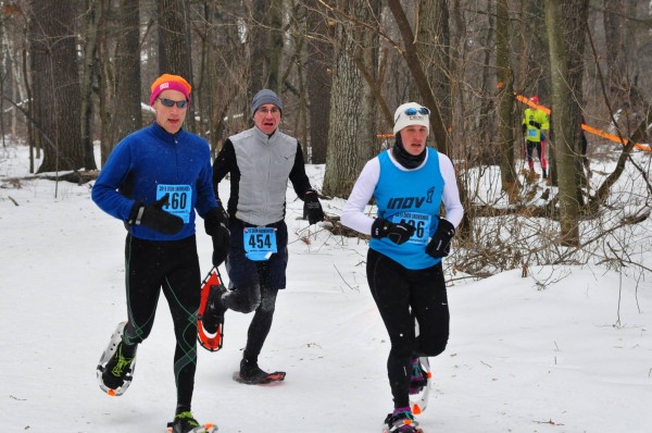 Amy Rusiecki (436), S. Deerfield, MA, wins the women's half-marathon silver shown here racing with trail friend, Erik Wight (L), Amherst, MA, who won his class silver. David Sapinski, Medford, also captured a class silver medal.