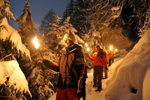 snowshoeing with torches