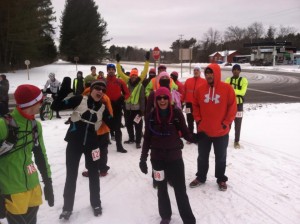 Runners, snowshoers, bikes and XC start together. Dan LaPlante (Left front) looks on as Lacy Lynn (middle) and Rachel Middleton Clark (R) lead the pre-start cheers