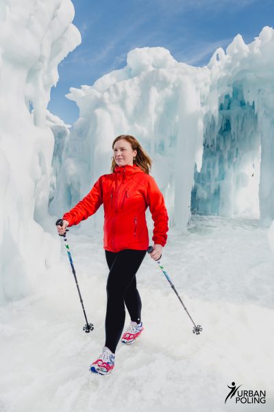 woman using Urban Nordic walking poles on icy conditions
