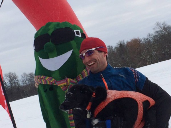 Brad Zoller with his training partner, Senna, last year in Barrington, IL for the Frozen Zucchini 5k snowshoe race. Photo courtesy of Brad Zoller. 