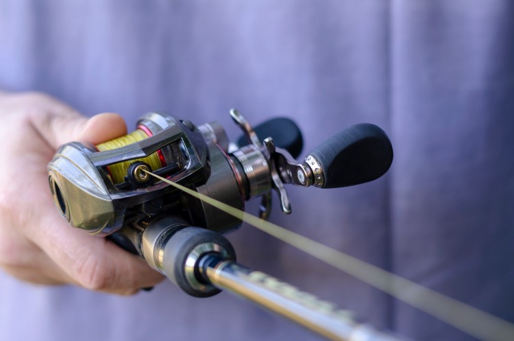 close up of baitcasting reel for winter fishing